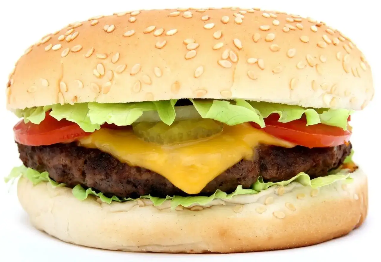 ludzie jedzący burgery promocje restauracje