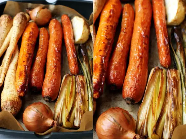 Pieczone warzywa: marchewki, pasternak, cebula i por, gotowe do przygotowania aromatycznego rosół z pieczonych warzyw.